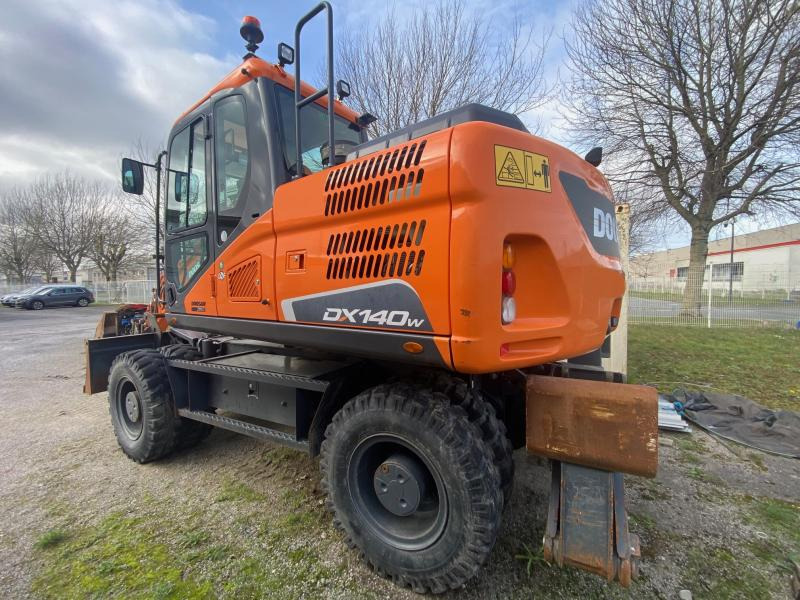 Pelle sur pneus Doosan DX 140W-5: photos 4