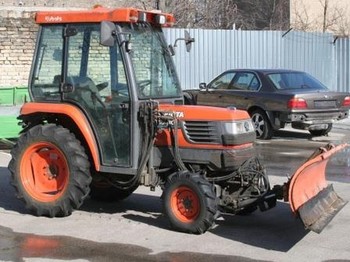 Kubota ST30 with brush and blade - Tracteur agricole