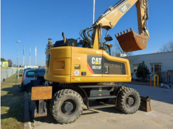 Pelle sur pneus CAT M315F: photos 3