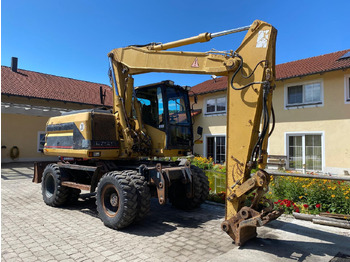 Pelle sur pneus CATERPILLAR M312