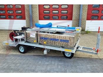 Véhicule vide-toilettes