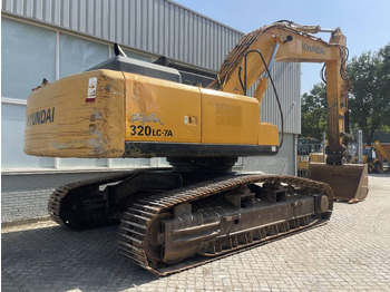 Pelle sur chenille Hyundai Robex 320 LC-7: photos 4