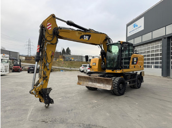 Pelle sur pneus CATERPILLAR M320F
