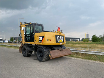 Pelle sur pneus CATERPILLAR M313D