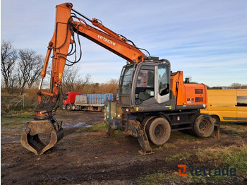 Pelle sur pneus HITACHI ZX140W-3