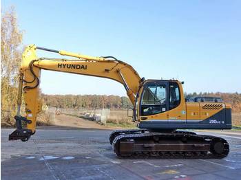 Pelle sur chenille Hyundai Robex 210: photos 1