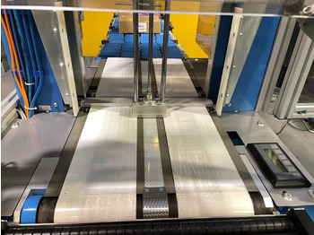 Machine d'emballage et de conditionnement ATS Tanner UltraSonic US 2000-AB transit banding machine with pneumatic product hold-down and infeed roller table: photos 5