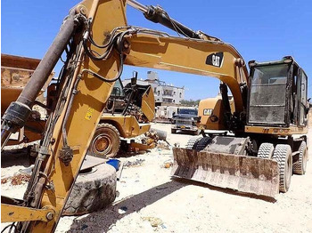 Pelle CATERPILLAR M320F