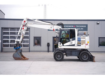 Pelle sur pneus KOMATSU PW148-11