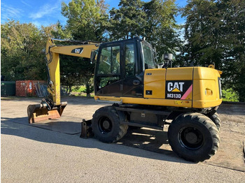 Pelle sur pneus CATERPILLAR M313D