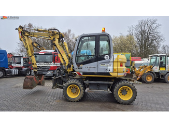 Pelle sur pneus NEW HOLLAND