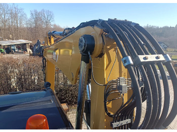 Pelle sur pneus CATERPILLAR M313D: photos 4