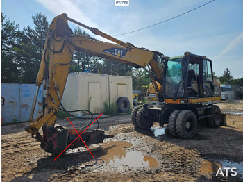 Pelle sur pneus CATERPILLAR M313C