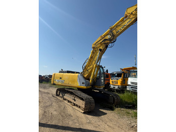 Pelle sur chenille NEW HOLLAND E 215 EXCAVATOR: photos 4 Pelle sur chenille NEW HOLLAND E 215 EXCAVATOR: photos 4