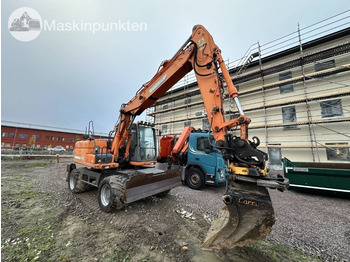 Pelle sur pneus Doosan DX 140 W med vagn och redskap: photos 2 Pelle sur pneus Doosan DX 140 W med vagn och redskap: photos 2