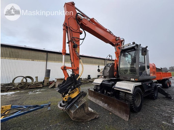 Pelle sur pneus HITACHI ZX140W-3