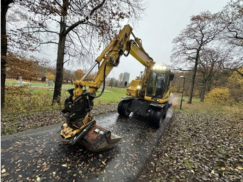 Pelle sur pneus Komatsu PW 148-11 med vagn och redskap: photos 2 Pelle sur pneus Komatsu PW 148-11 med vagn och redskap: photos 2