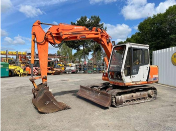 Pelle sur chenille Hitachi EX60: photos 3