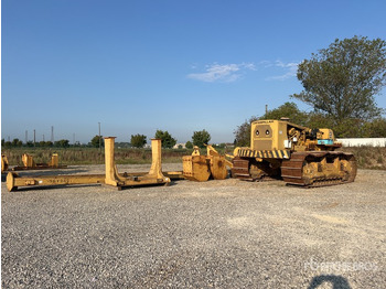 Poseur de canalisations CATERPILLAR