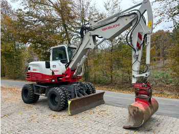 Pelle sur pneus TAKEUCHI TB 295 W: photos 4