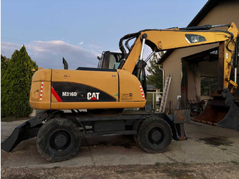 Pelle sur pneus CATERPILLAR M316D