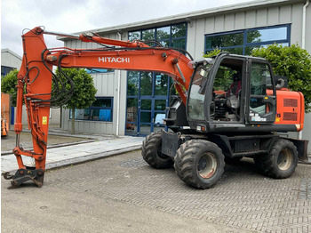 Pelle sur pneus HITACHI ZX140W-3