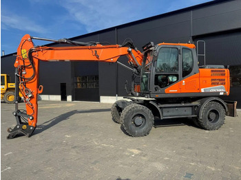 Pelle sur pneus Doosan DX140-5 2018: photos 2