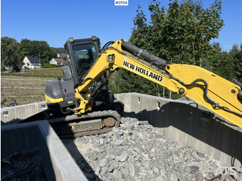 Pelle sur chenille New Holland E55B: photos 5