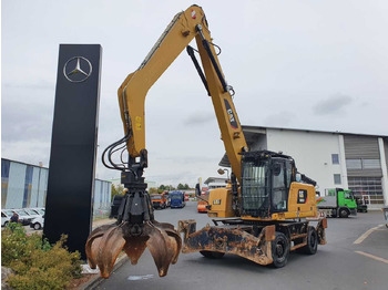 Pelle sur pneus CATERPILLAR MH3024