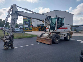 Pelle sur pneus CATERPILLAR M313D