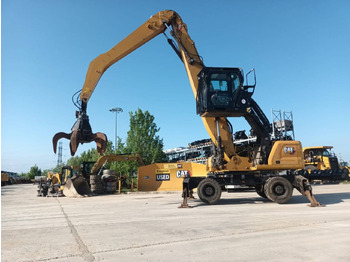 Pelle sur pneus CATERPILLAR