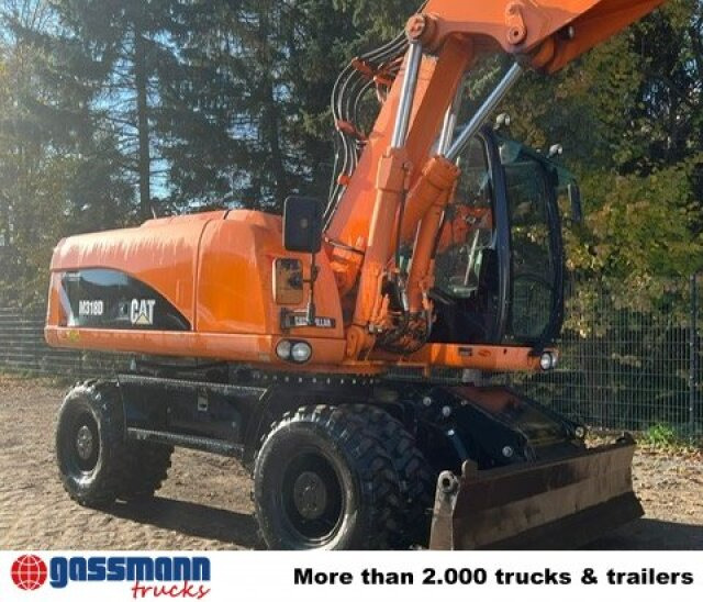 CAT M318D Mobilbagger - Engins de chantier: photos 5 CAT M318D Mobilbagger - Engins de chantier: photos 5