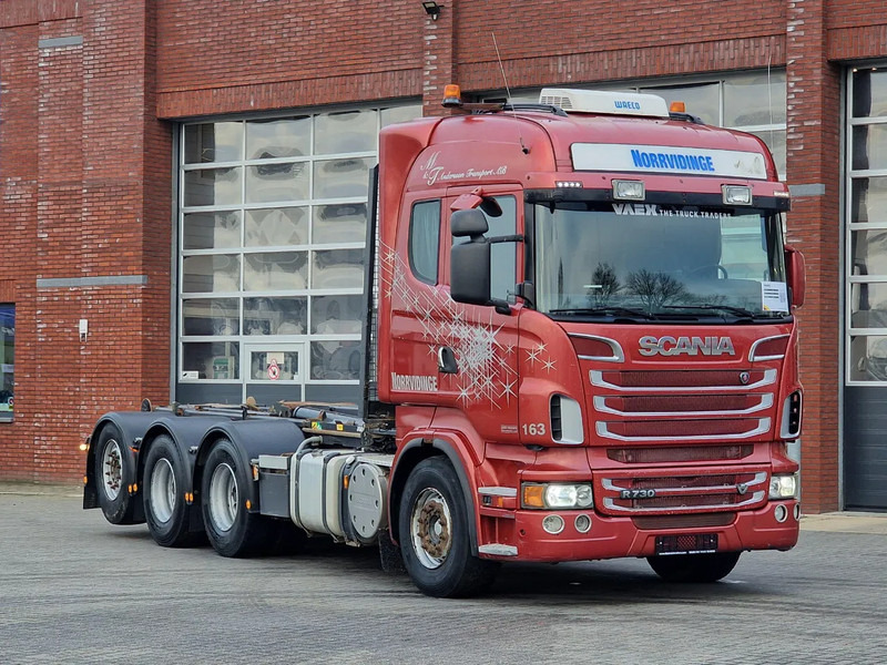 Scania R730 V8 Highline - 8x4*4 - JOAB Hooklift - Steering axle - Full air - Night clima - Camion ampliroll: photos 1 Scania R730 V8 Highline - 8x4*4 - JOAB Hooklift - Steering axle - Full air - Night clima - Camion ampliroll: photos 1