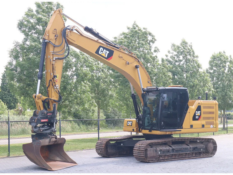 Caterpillar 323 07A | ROTOTILT | GPS NOVATRON | OILQUICK | FULL OPTION - Pelle sur chenille: photos 2 Caterpillar 323 07A | ROTOTILT | GPS NOVATRON | OILQUICK | FULL OPTION - Pelle sur chenille: photos 2
