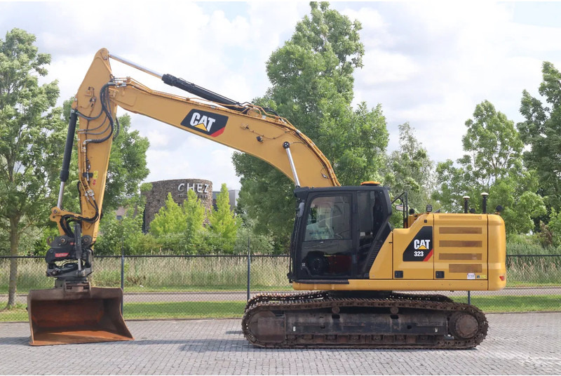 Caterpillar 323 07A | ROTOTILT | GPS NOVATRON | OILQUICK | FULL OPTION - Pelle sur chenille: photos 1 Caterpillar 323 07A | ROTOTILT | GPS NOVATRON | OILQUICK | FULL OPTION - Pelle sur chenille: photos 1