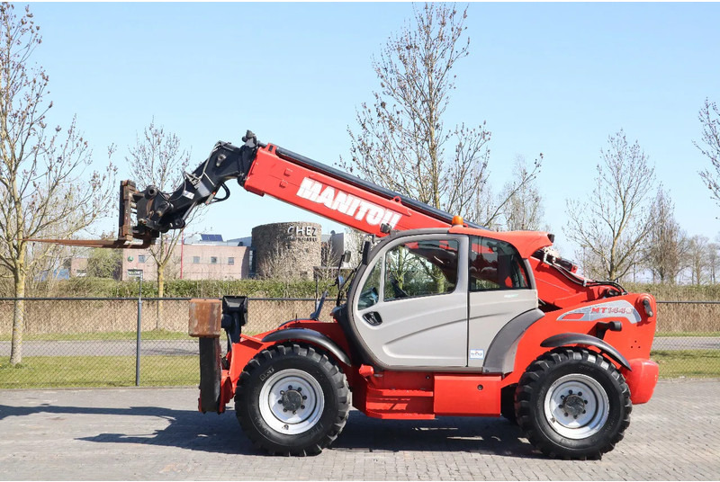 Manitou MT 1440 EASY | AIRCO | HYDR. FORKS - Chariot télescopique: photos 1 Manitou MT 1440 EASY | AIRCO | HYDR. FORKS - Chariot télescopique: photos 1