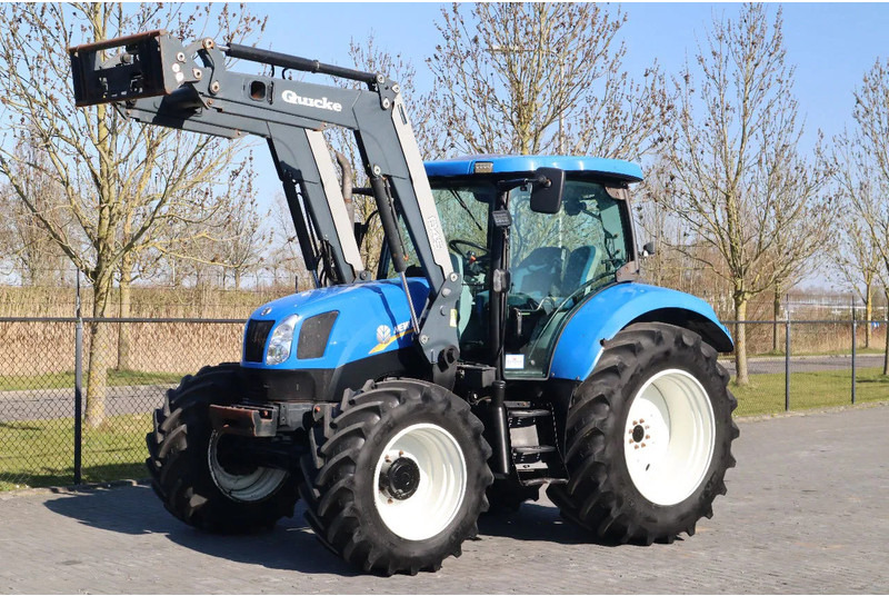 New Holland T6040 | FRONT LOADER | 50KM/H | QUICK COUPLER - Tracteur agricole: photos 1 New Holland T6040 | FRONT LOADER | 50KM/H | QUICK COUPLER - Tracteur agricole: photos 1