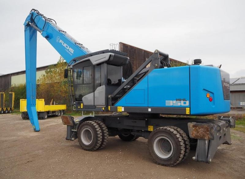 Fuchs MHL350 - Pelle de manutention: photos 1 Fuchs MHL350 - Pelle de manutention: photos 1