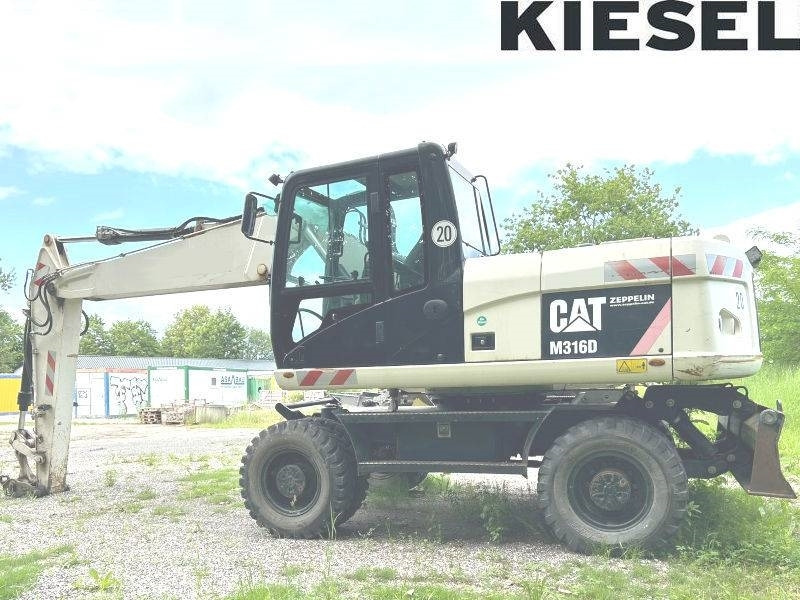 CAT M 316 D - Pelle sur pneus: photos 1 CAT M 316 D - Pelle sur pneus: photos 1