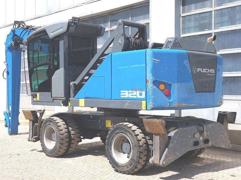 Fuchs MHL 320 F - Pelle de manutention: photos 3 Fuchs MHL 320 F - Pelle de manutention: photos 3