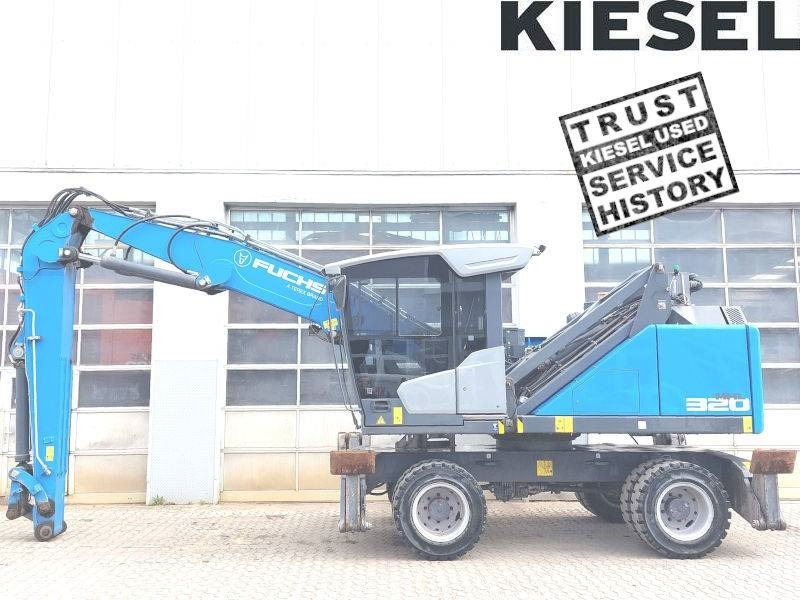 Fuchs MHL 320 F - Pelle de manutention: photos 1 Fuchs MHL 320 F - Pelle de manutention: photos 1