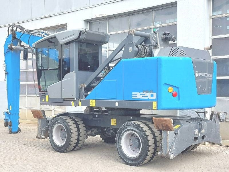 Fuchs MHL 320 F - Pelle de manutention: photos 3 Fuchs MHL 320 F - Pelle de manutention: photos 3