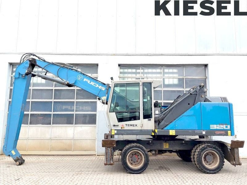 Fuchs MHL 320 F - Pelle de manutention: photos 1 Fuchs MHL 320 F - Pelle de manutention: photos 1