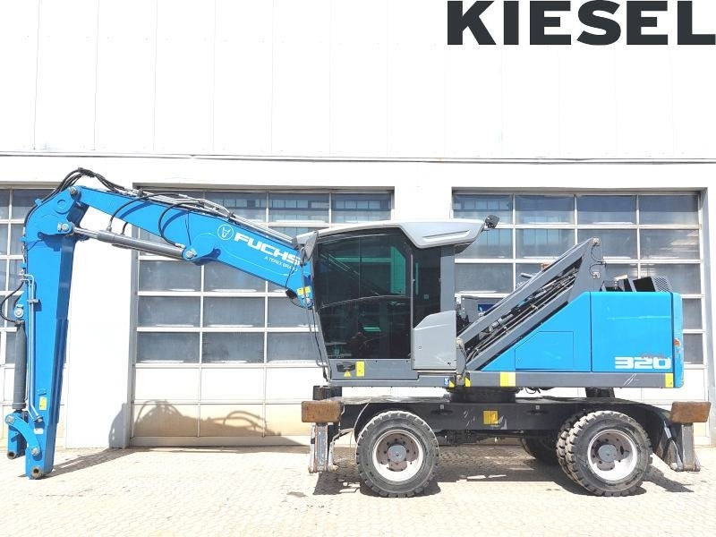 Fuchs MHL 320 F - Pelle de manutention: photos 1 Fuchs MHL 320 F - Pelle de manutention: photos 1