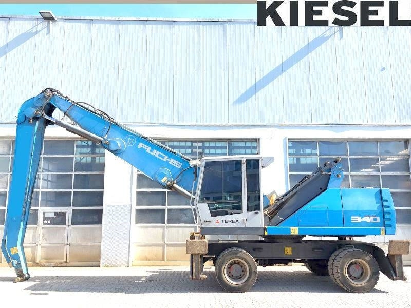 Fuchs MHL 340 E - Pelle de manutention: photos 1 Fuchs MHL 340 E - Pelle de manutention: photos 1