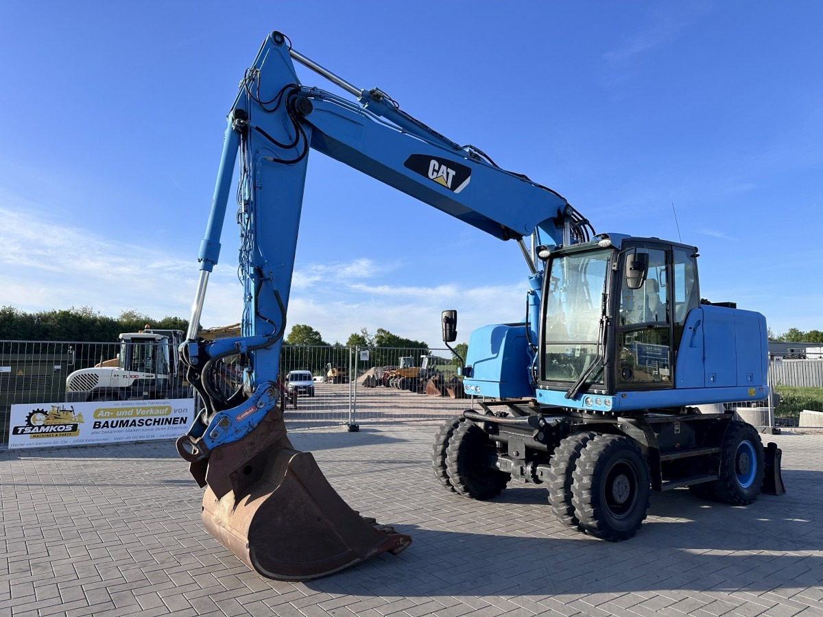 CATERPILLAR M 318 F Oil Quick OQ 65 Deutsche Maschine Top ! - Pelle sur pneus: photos 3 CATERPILLAR M 318 F Oil Quick OQ 65 Deutsche Maschine Top ! - Pelle sur pneus: photos 3