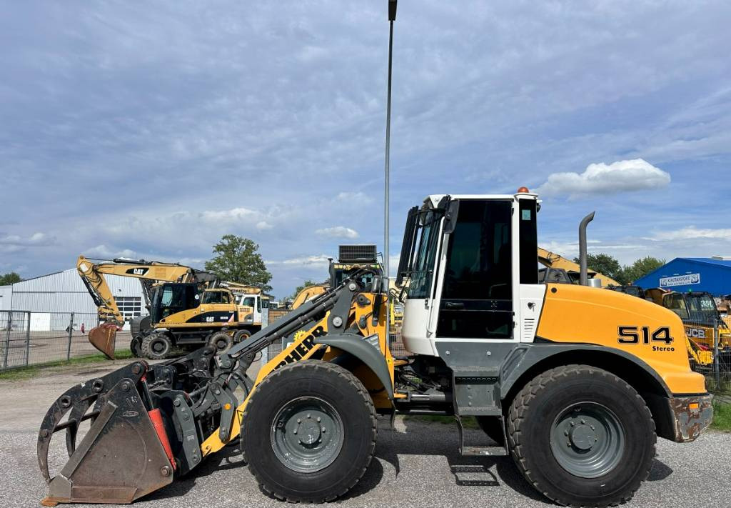 Liebherr L 514 Stereo +30 Kmh Klima 3er Kreis Greifschaufel - Chargeuse sur pneus: photos 1 Liebherr L 514 Stereo +30 Kmh Klima 3er Kreis Greifschaufel - Chargeuse sur pneus: photos 1