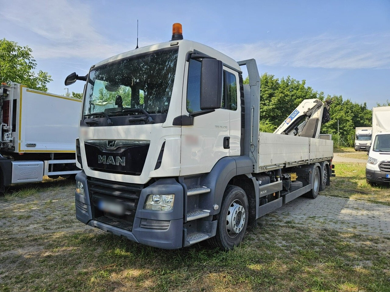 MAN TGS 26.430 6x2-4 BL TGS 26.430 6x2-4 BL, Lenk-/Liftachse, Heckkran HMF 3220K3, Funk - Camion grue, Camion plateau: photos 1 MAN TGS 26.430 6x2-4 BL TGS 26.430 6x2-4 BL, Lenk-/Liftachse, Heckkran HMF 3220K3, Funk - Camion grue, Camion plateau: photos 1