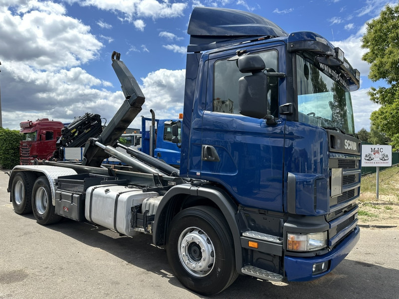 Scania 124L-420 6x2 HOOKLIFT VDL 20T - STEEL SPRING / BALLESTAS / BLATT - MANUAL - MECHANICAL PUMP - 10 TIRES DOUBLE WHEELS - Camion ampliroll: photos 1 Scania 124L-420 6x2 HOOKLIFT VDL 20T - STEEL SPRING / BALLESTAS / BLATT - MANUAL - MECHANICAL PUMP - 10 TIRES DOUBLE WHEELS - Camion ampliroll: photos 1