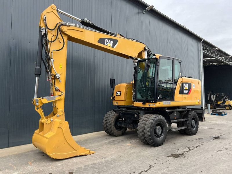 Cat M318F - Extremely Nice Condition - Pelle sur pneus: photos 1 Cat M318F - Extremely Nice Condition - Pelle sur pneus: photos 1